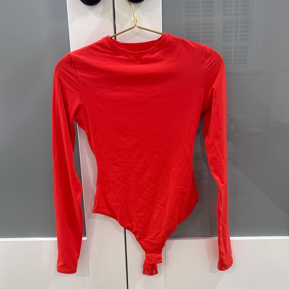 SKIMS Vibrant Red Long Sleeve Bodysuit